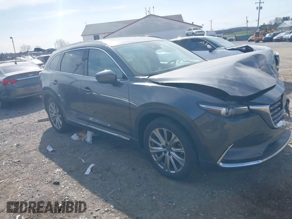 2021 Mazda CX-9 Signature with VIN JM3TCBEY5M0523199, listed as a IAAI auction lot 41916480 with 56,772 mi miles. Bid and sale history available at carsss.com. Image 1.