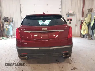 2018 Cadillac XT5 Premium Luxury AWD z VIN 1GYKNFRS6JZ114464, wystawiony jako IAAI lot #42320302 z przebiegiem 61 231 mil mil oraz . Historia ofert i sprzedaży dostępna na DreamBid. Obrazek 17.