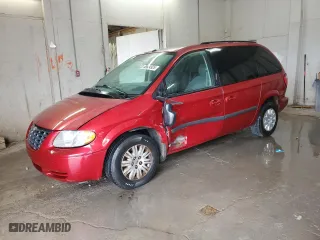 2007 Chrysler Town & Country SWB with VIN 1A4GJ45R27B187650, listed as a Copart auction lot 49824925 with 153,097 mi miles and Salvage Title. Bid and sale history available at carsss.com. Image 1.
