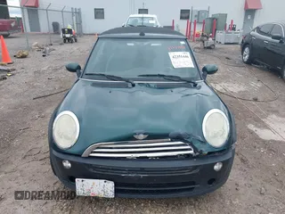 2005 MINI Convertible with VIN WMWRF33495TG11818, listed as a IAAI auction lot 42351446 with 100,033 mi miles and . Bid and sale history available at DreamBid. Image 12.