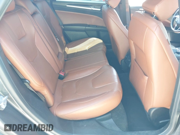 2020 Ford Fusion Titanium with VIN 3FA6P0K96LR173971, listed as a IAAI auction lot 42232469 with 82,474 mi miles and . Bid and sale history available at DreamBid. Image 8.