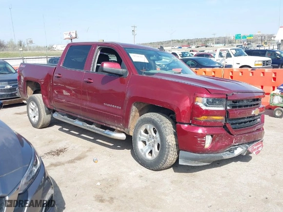 2016 Chevrolet Silverado 1500 LT with VIN 3GCUKREC0GG354271, listed as a IAAI auction lot 38948207 with 130,369 mi miles. Bid and sale history available at carsss.com. Image 1.