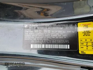 2011 BMW Z4 sDrive35i z VIN WBALM7C51BE383595, wystawiony jako Copart lot #54887695 z przebiegiem Nie podano mil oraz Szkody całkowita. Historia ofert i sprzedaży dostępna na DreamBid. Obrazek 12.
