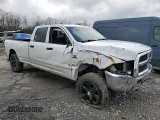 2014 Ram 2500 Tradesman with VIN 3C6UR5HL3EG301472, listed as a Copart auction lot 42656075 with 174,311 mi miles and Salvage title. Bid and sale history available at DreamBid. Image 4.