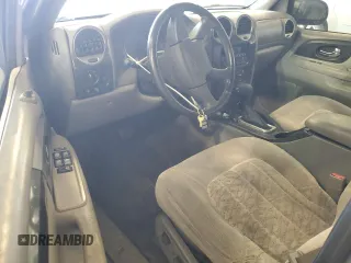2004 GMC Envoy XL SLE with VIN 1GKET16S146120697, listed as a Copart auction lot 79917634 with 0 mi miles and Salvage Title. Bid and sale history available at carsss.com. Image 8.