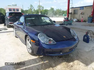 2001 Porsche 911 z VIN WP0CA29921S653510, wystawiony jako IAAI lot #42446581 z przebiegiem 70 415 mil mil oraz . Historia ofert i sprzedaży dostępna na DreamBid. Obrazek 1.