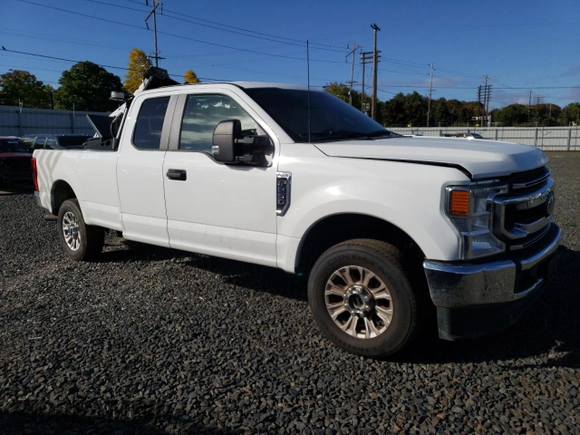 2022 Ford F-250 XL with VIN 1FT7X2B63NEG34856, listed as a Copart auction lot 70211314 with 30,919 mi miles and Salvage Title. Bid and sale history available at DreamBid. Image 4.