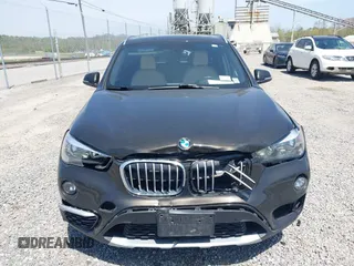 2018 BMW X1 xDrive28i with VIN WBXHT3C39J5F88234, listed as a IAAI auction lot 42044900 with 38,732 mi miles. Bid and sale history available at carsss.com. Image 12.
