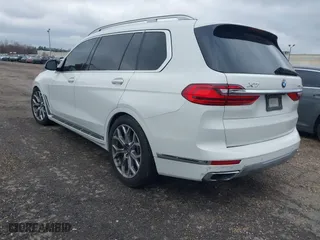 2019 BMW X7 xDrive40i with VIN 5UXCW2C53KL083874, listed as a IAAI auction lot 41280522 with 155,067 mi miles. Bid and sale history available at carsss.com. Image 3.
