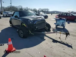 2012 MINI Convertible S with VIN WMWZP3C58CT296381, listed as a Copart auction lot 50834655 with 111,228 mi miles and Salvage Title. Bid and sale history available at DreamBid. Image 11.