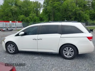 2015 Honda Odyssey EX-L z VIN 5FNRL5H61FB107735, wystawiony jako IAAI lot #42255001 z przebiegiem 170 825 mil mil oraz . Historia ofert i sprzedaży dostępna na DreamBid. Obrazek 14.