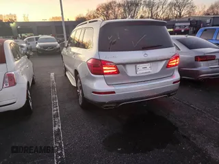2015 Mercedes-Benz GL-Class GL 450 with VIN 4JGDF6EE0FA533195, listed as a IAAI auction lot 41519194 with 104,095 mi miles. Bid and sale history available at carsss.com. Image 3.