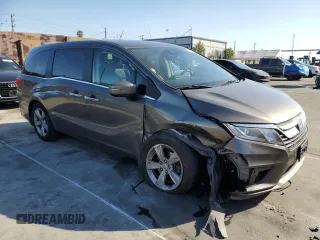 2018 Honda Odyssey EX-L with VIN 5FNRL6H78JB003220, listed as a Copart auction lot 48493355 with 127,807 mi miles and Salvage Title. Bid and sale history available at carsss.com. Image 4.