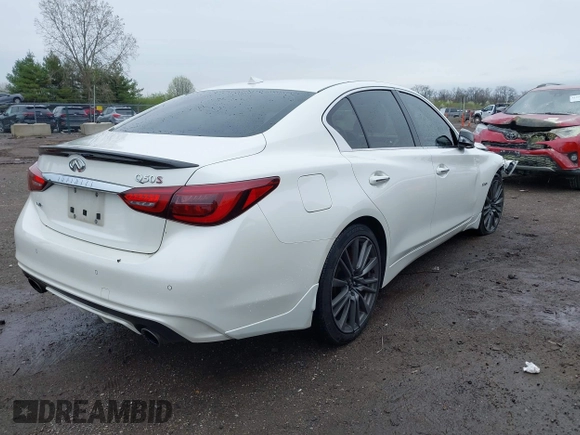 2020 Infiniti Q50 Red Sport 400 with VIN JN1FV7AR0LM660315, listed as a IAAI auction lot 41951851 with 102,475 mi miles and . Bid and sale history available at carsss.com. Image 4.