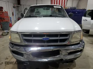 1997 Ford F-150 z VIN 1FTDF18W4VKD41606, wystawiony jako Copart lot #83808524 z przebiegiem 173 675 mil mil oraz Czysty tytuł • Clean title. Historia ofert i sprzedaży dostępna na DreamBid. Obrazek 5.