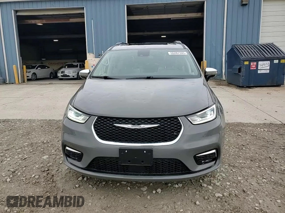 2023 Chrysler Pacifica Limited with VIN 2C4RC1GG0PR529598, listed as a Copart auction lot 55287345 with 65,714 mi miles and Salvage title. Bid and sale history available at DreamBid. Image 14.