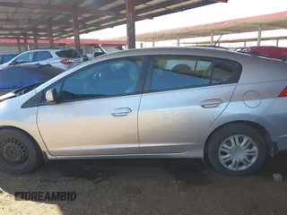 2010 Honda Insight LX z VIN JHMZE2H53AS007016, wystawiony jako IAAI lot #42096274 z przebiegiem 173 519 mil mil oraz . Historia ofert i sprzedaży dostępna na DreamBid. Obrazek 14.
