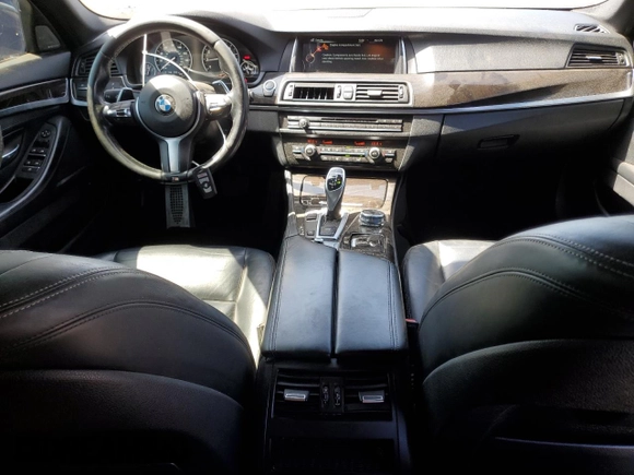 2016 BMW 5 Series 535i with VIN WBA5B1C52GG552692, listed as a Copart auction lot 64121225 with 114,708 mi miles and Salvage title. Bid and sale history available at DreamBid. Image 8.