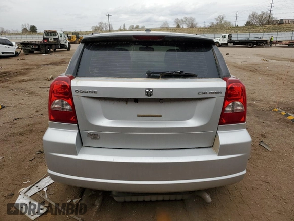 2011 Dodge Caliber Mainstreet with VIN 1B3CB3HA6BD182726, listed as a Copart auction lot 50909755 with 99,305 mi miles and Salvage Title. Bid and sale history available at carsss.com. Image 6.