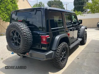 2023 Jeep Wrangler Sahara with VIN 1C4JJXP65PW627241, listed as a Copart auction lot 55661585 with 9,282 mi miles and Clean Title. Bid and sale history available at DreamBid. Image 4.