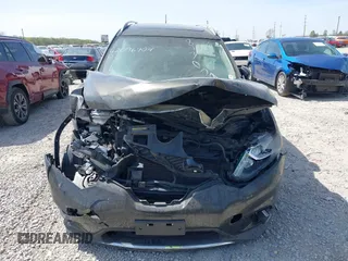 2015 Nissan Rogue SL with VIN 5N1AT2MV9FC813059, listed as a IAAI auction lot 42096904 with 121,494 mi miles and . Bid and sale history available at carsss.com. Image 11.
