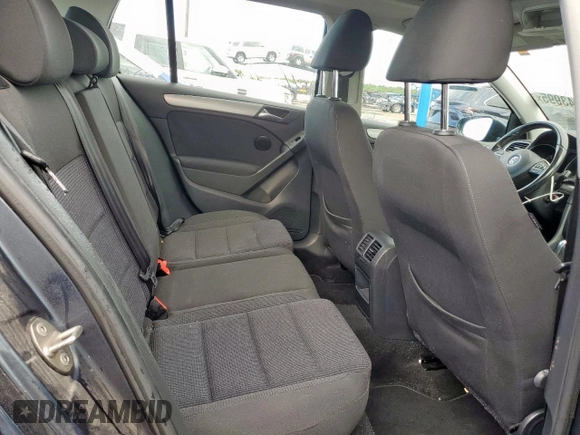 2014 Volkswagen Golf TDI w/Sunroof & Nav z VIN WVWDM7AJ2EW000544, wystawiony jako Copart lot #59343995 z przebiegiem 128 421 mil mil oraz Szkoda całkowita • Salvage title. Historia ofert i sprzedaży dostępna na DreamBid. Obrazek 10.