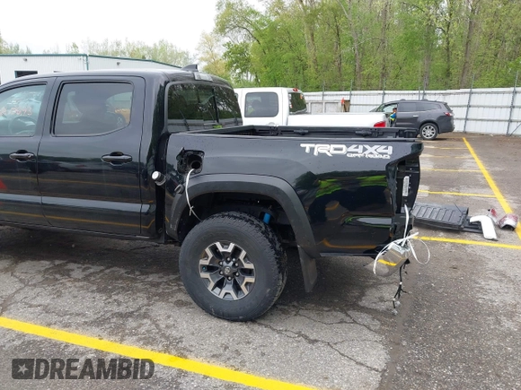 2021 Toyota Tacoma SR with VIN 3TMCZ5AN0MM417261, listed as a IAAI auction lot 42240693 with 38,625 mi miles and . Bid and sale history available at DreamBid. Image 22.