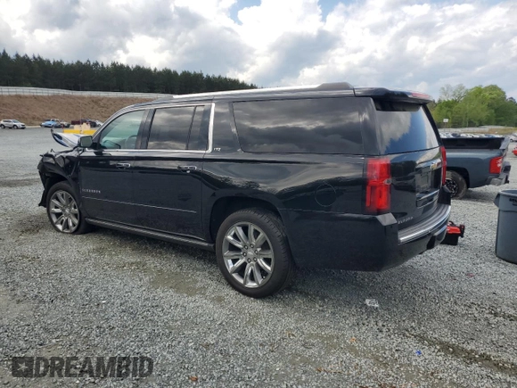 2015 Chevrolet Suburban LTZ with VIN 1GNSKKKC4FR119803, listed as a Copart auction lot 51416775 with 135,366 mi miles and Salvage Title. Bid and sale history available at DreamBid. Image 2.