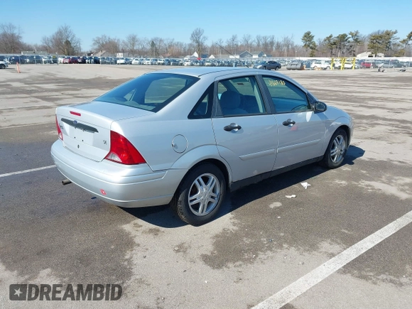 2004 Ford Focus SE with VIN 1FAFP34394W120884, listed as a IAAI auction lot 41663180 with 213,972 mi miles and . Bid and sale history available at DreamBid. Image 4.