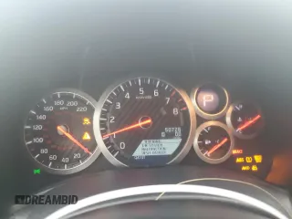 2015 Nissan GT-R Premium z VIN JN1AR5EF5FM281737, wystawiony jako Copart lot #80119804 z przebiegiem 50 726 mil mil oraz Szkody całkowita. Historia ofert i sprzedaży dostępna na DreamBid. Obrazek 9.