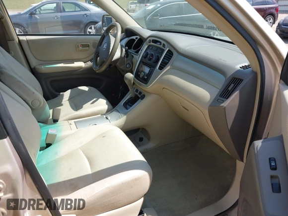 2006 Toyota Highlander z VIN JTEDW21A460001983, wystawiony jako IAAI lot #41919095 z przebiegiem 303 345 mil mil oraz . Historia ofert i sprzedaży dostępna na DreamBid. Obrazek 5.