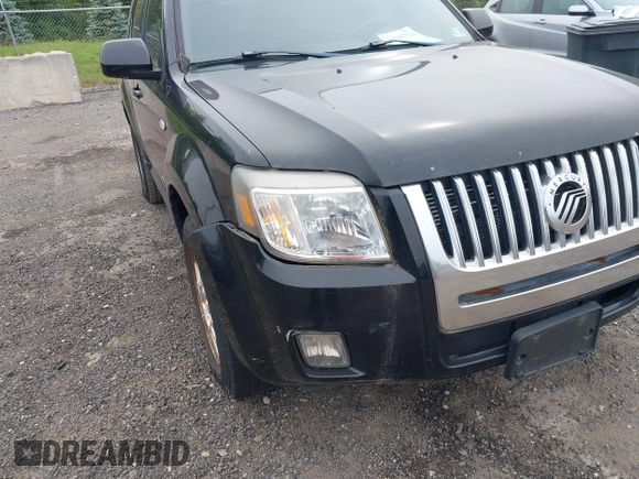 2008 Mercury Mariner Premier z VIN 4M2CU97148KJ47971, wystawiony jako IAAI lot #42355222 z przebiegiem 168 319 mil mil oraz . Historia ofert i sprzedaży dostępna na DreamBid. Obrazek 6.