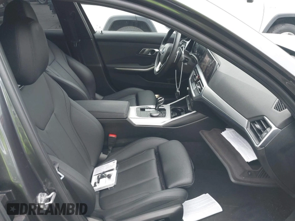 2021 BMW 3 Series 330i with VIN 3MW5R1J07M8C06389, listed as a IAAI auction lot 42024380 with 30,861 mi miles and . Bid and sale history available at DreamBid. Image 5.