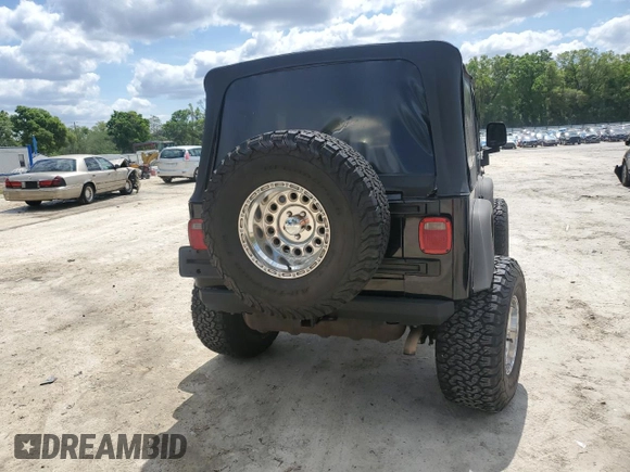 2006 Jeep Wrangler Sport with VIN 1J4FA49S36P704481, listed as a Copart auction lot 48362505 with 122,600 mi miles and Salvage Title. Bid and sale history available at carsss.com. Image 6.