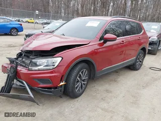 2020 Volkswagen Tiguan SE with VIN 3VV2B7AX2LM018722, listed as a IAAI auction lot 41802291 with 58,914 mi miles. Bid and sale history available at carsss.com. Image 2.