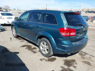 2009 Dodge Journey SXT with VIN 3D4GG57V09T170094, listed as a IAAI auction lot 41867577 with 122,831 mi miles. Bid and sale history available at carsss.com. Image 3.
