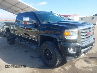 2017 GMC Sierra 2500HD SLT with VIN 1GT12TEY9HF130351, listed as a IAAI auction lot 41503777 with 105,756 mi miles. Bid and sale history available at carsss.com. Image 1.