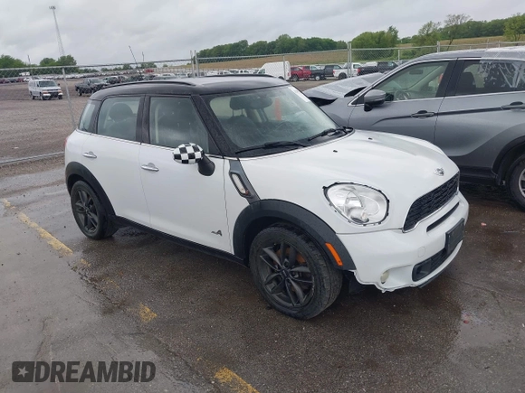 2013 MINI Countryman S ALL4 with VIN WMWZC5C50DWP30199, listed as a IAAI auction lot 42399104 with 103,367 mi miles and . Bid and sale history available at DreamBid. Image 1.