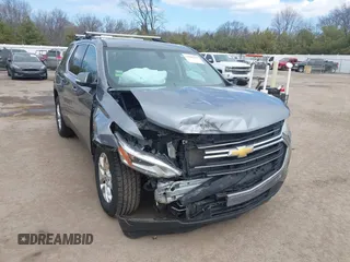 2019 Chevrolet Traverse LT Cloth z VIN 1GNEVGKW9KJ309746, wystawiony jako IAAI lot #41880333 z przebiegiem 74 324 mil mil oraz . Historia ofert i sprzedaży dostępna na DreamBid. Obrazek 1.