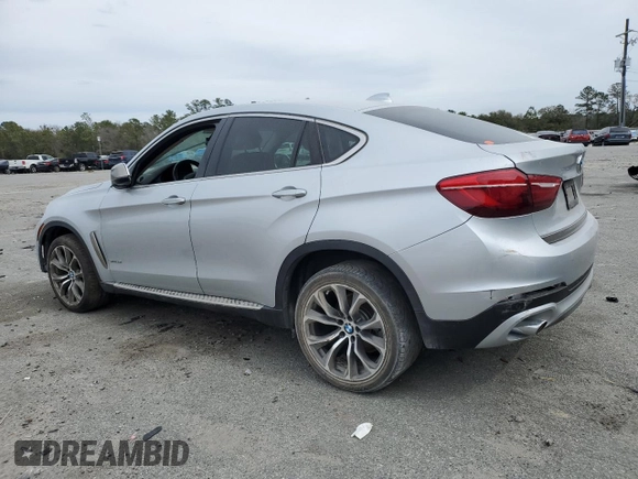 2016 BMW X6 sDrive35i with VIN 5UXKU0C57G0F93386, listed as a Copart auction lot 45123974 with Not Provided miles and . Bid and sale history available at DreamBid. Image 2.