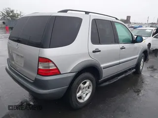 1998 Mercedes-Benz M-Class with VIN 4JGAB54E1WA045397, listed as a IAAI auction lot 41204055 with 1 mi miles. Bid and sale history available at carsss.com. Image 4.