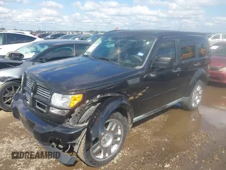 2011 Dodge Nitro Heat with VIN 1D4PT4GK7BW602014, listed as a IAAI auction lot 42371556 with 143,986 mi miles and . Bid and sale history available at DreamBid. Image 2.
