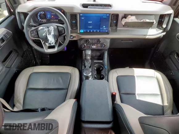 2024 Ford Bronco Wildtrak z VIN 1FMEE2BP4RLB23952, wystawiony jako Copart lot #61547765 z przebiegiem 12 180 mil mil oraz Nie do naprawy • Non repairable. Historia ofert i sprzedaży dostępna na DreamBid. Obrazek 8.