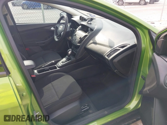 2018 Ford Focus SE z VIN 1FADP3FE5JL222542, wystawiony jako IAAI lot #42265608 z przebiegiem 107 397 mil mil oraz . Historia ofert i sprzedaży dostępna na DreamBid. Obrazek 5.