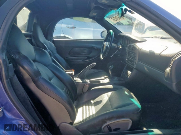 1999 Porsche Boxster z VIN WP0CA2980XU629582, wystawiony jako Copart lot #57534035 z przebiegiem 190 873 mil mil oraz Czysty tytuł • Clean title. Historia ofert i sprzedaży dostępna na DreamBid. Obrazek 10.