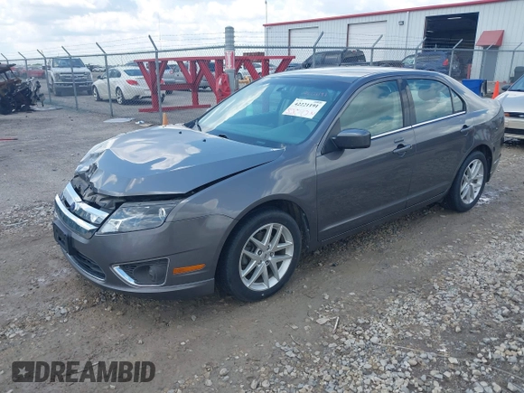 2012 Ford Fusion SEL z VIN 3FAHP0JG4CR265377, wystawiony jako IAAI lot #42221191 z przebiegiem 154 442 mil mil oraz . Historia ofert i sprzedaży dostępna na DreamBid. Obrazek 17.