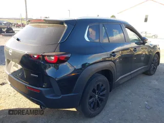 2023 Mazda CX-50 2.5 S Preferred Plus Package with VIN 7MMVABCM0PN138180, listed as a IAAI auction lot 41875179 with 33,652 mi miles. Bid and sale history available at carsss.com. Image 4.