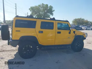 2003 Hummer H2 with VIN 5GRGN23U93H108017, listed as a IAAI auction lot 41793034 with 203,739 mi miles. Bid and sale history available at carsss.com. Image 13.