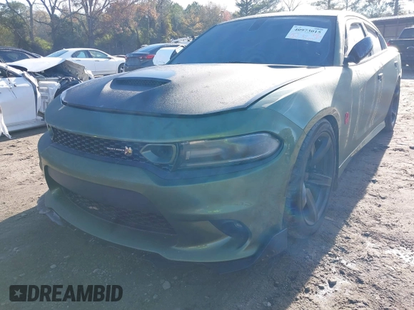 2019 Dodge Charger Scat Pack with VIN 2C3CDXGJ4KH572619, listed as a IAAI auction lot 40973015 with 40,148 mi miles and . Bid and sale history available at DreamBid. Image 6.