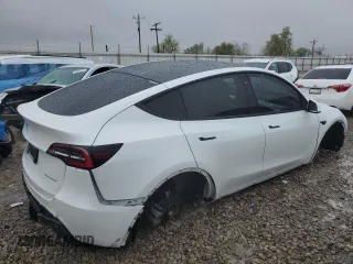2020 Tesla Model Y Long Range z VIN 5YJYGDEE4LF052702, wystawiony jako Copart lot #53243385 z przebiegiem 75 917 mil mil oraz Szkoda całkowita • Salvage title. Historia ofert i sprzedaży dostępna na DreamBid. Obrazek 3.